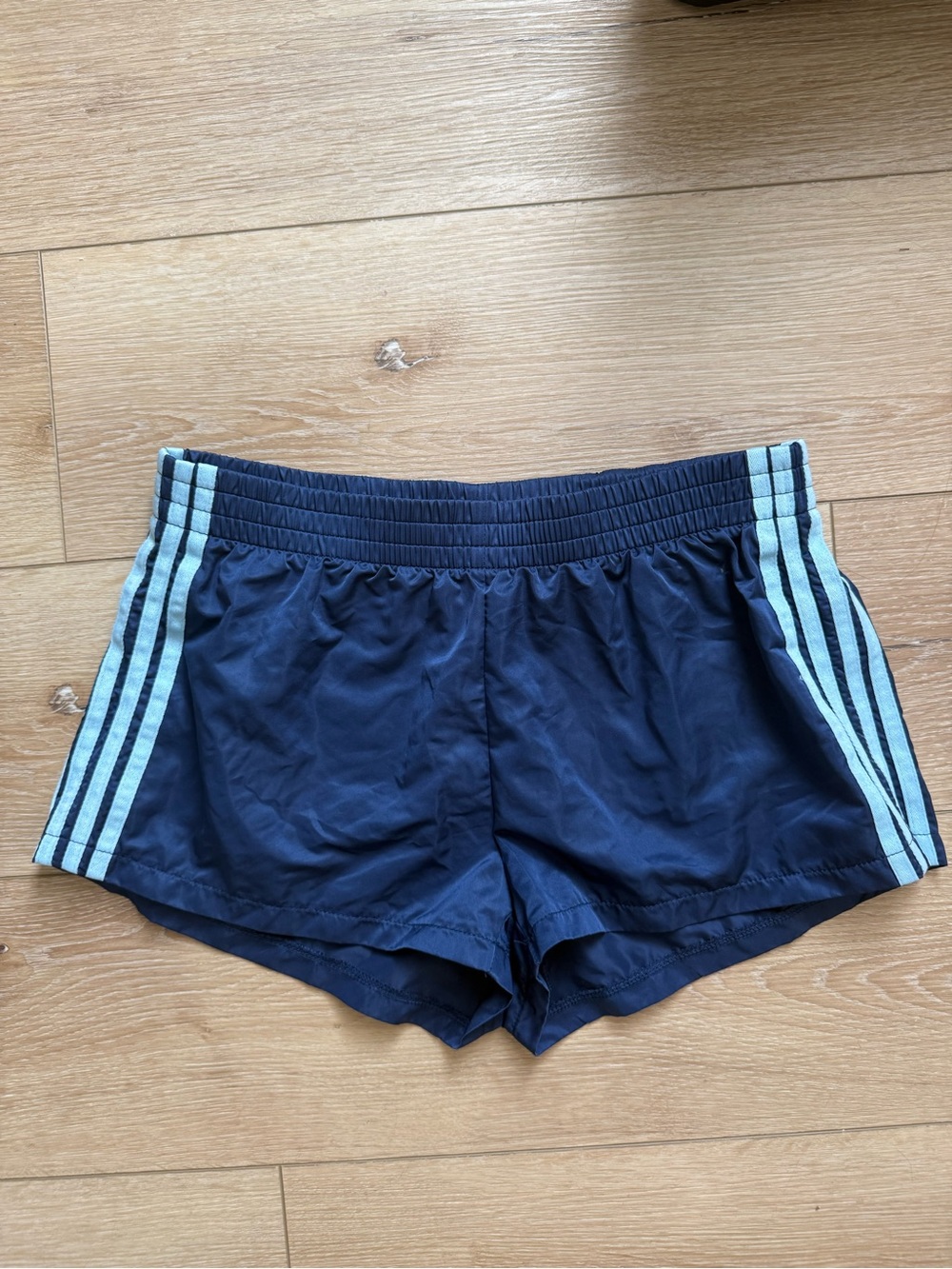 Edikted Navy Athletic Shorts with Light Blue Side Stripes
